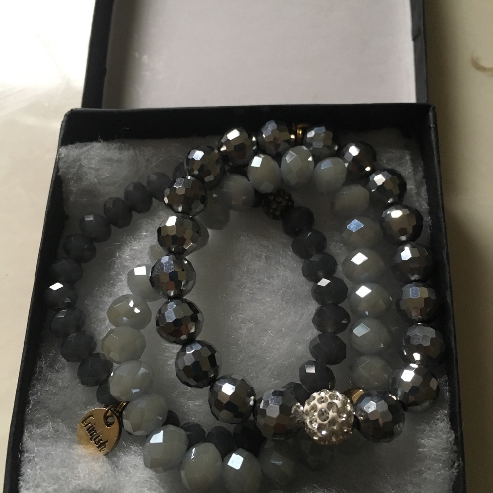 Includes all three bracelets shown